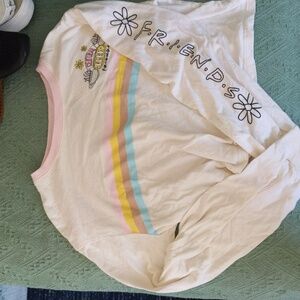 A long sleeve slightly cropped shirt.